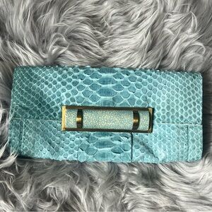 R&Y Augousti used blue snakeskin and stingray clutch - Ultrasoft & Chic